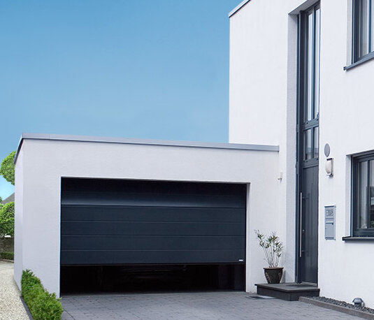 Portes de garage sectionnelles sur-mesure - Fabricant TUBAUTO